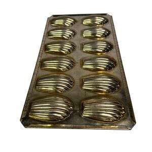 vintage madeleine mold, used for baking small, French shell cakes